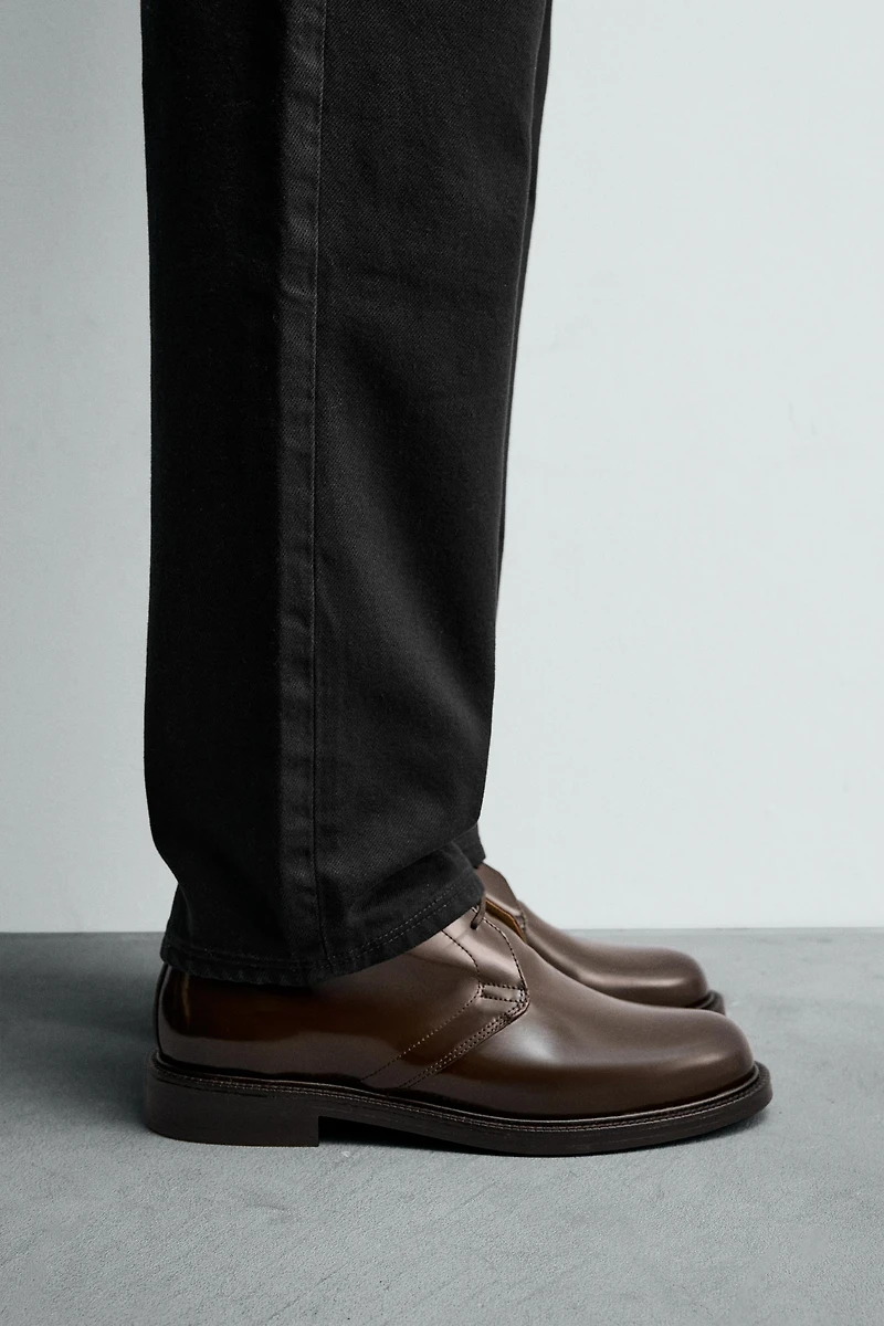 GLOSSY LEATHER BOOTS