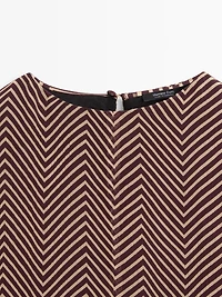 Flowing geometric print blouse