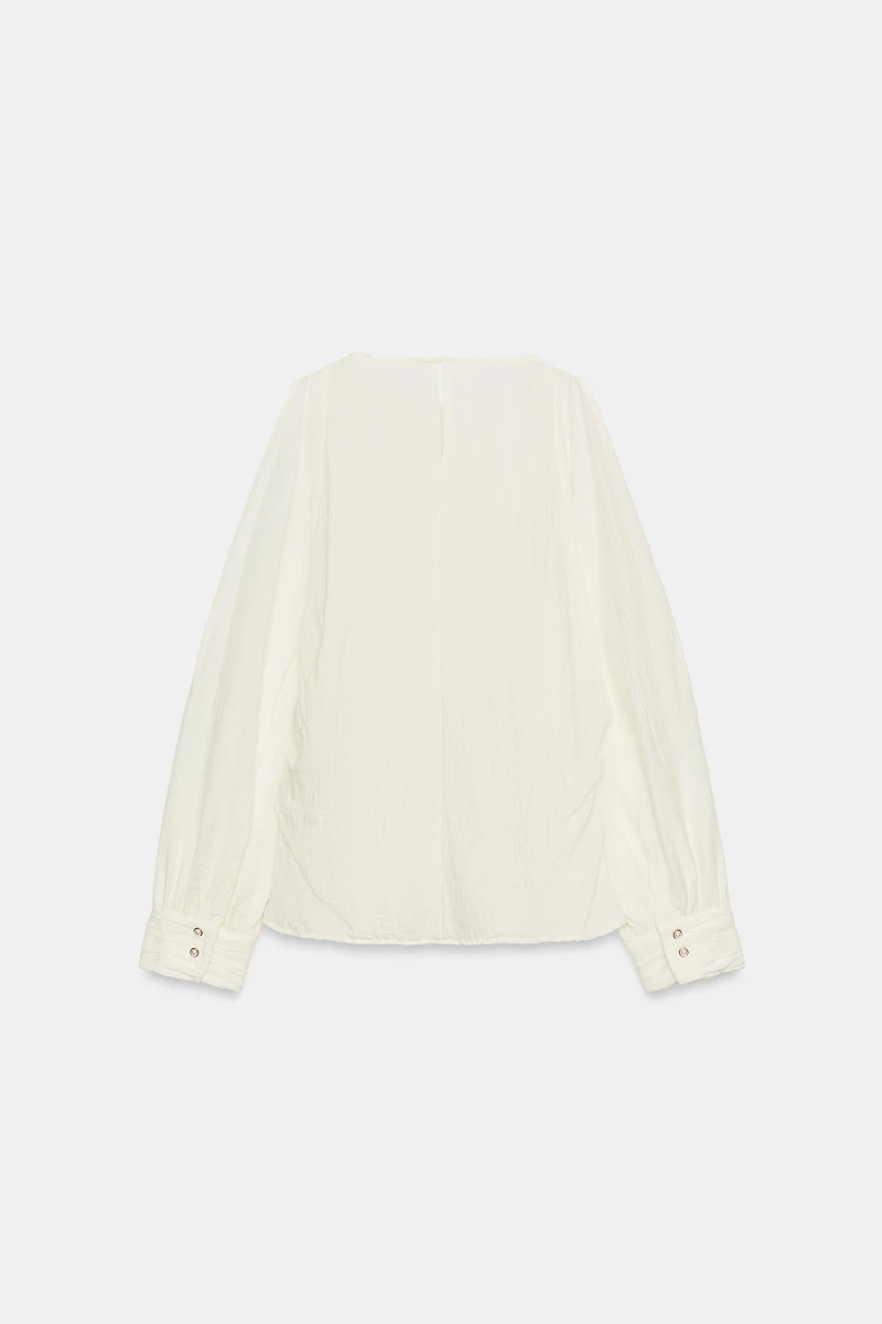 BLOUSE WITH SLEEVE SLITS