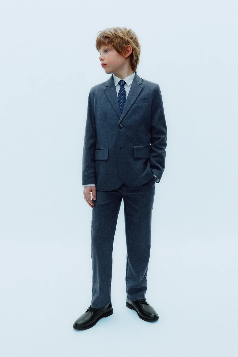 TEXTURED SUIT PANTS