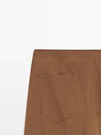 Flare fit cotton blend trousers