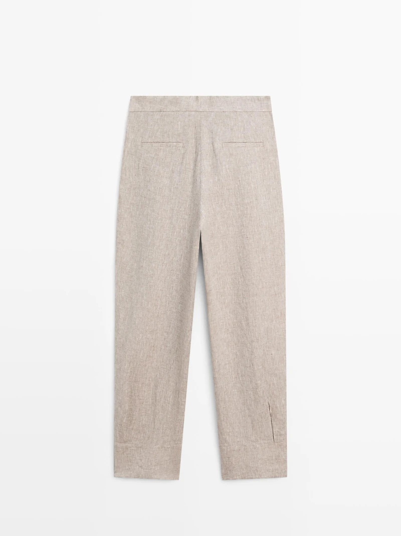 Suit trousers with buckle detail