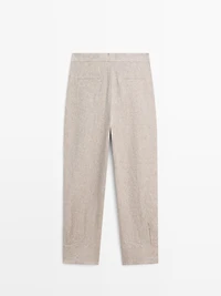 Suit trousers with buckle detail