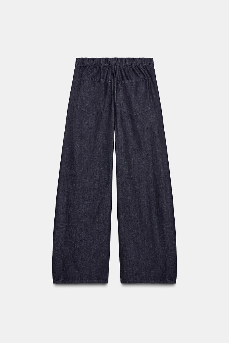 PLEATED FAUX DENIM PANTS