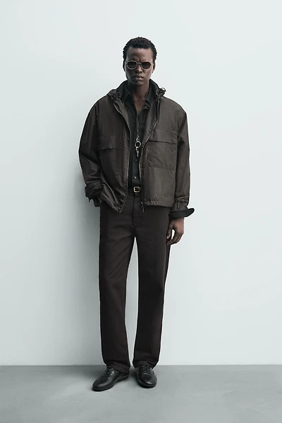 HOODED TECHNICAL JACKET