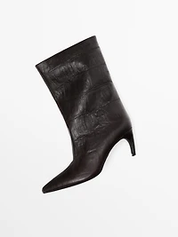Bottines à talon en cuir grav