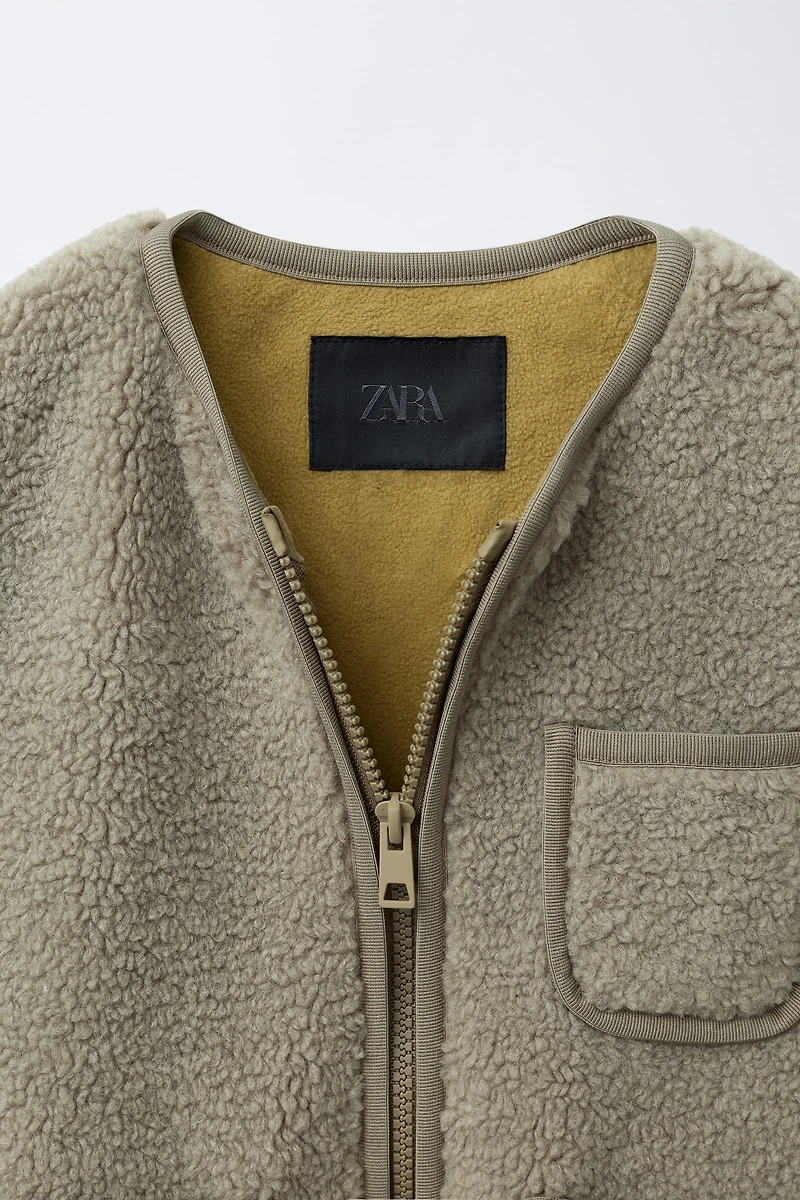 SNOOPY PEANUTS™ SHEARLING VEST
