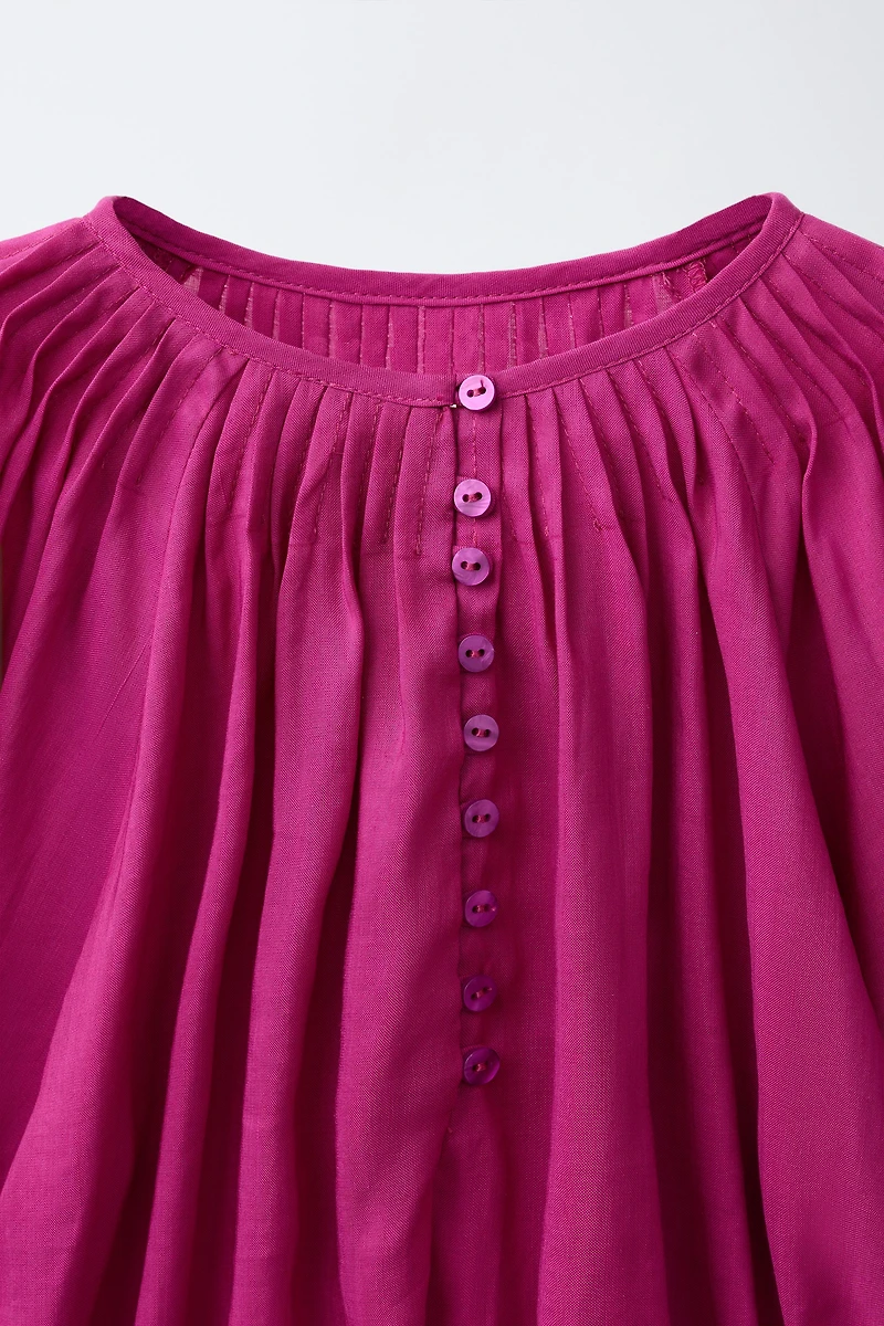 BLOUSE PLIS NERVURÉS AVEC RAMIE