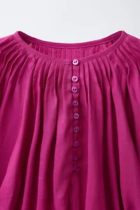 BLOUSE PLIS NERVURÉS AVEC RAMIE