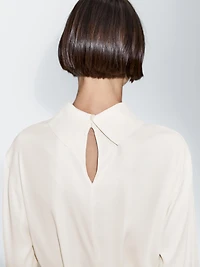 Long sleeve blouse with drawstring detail