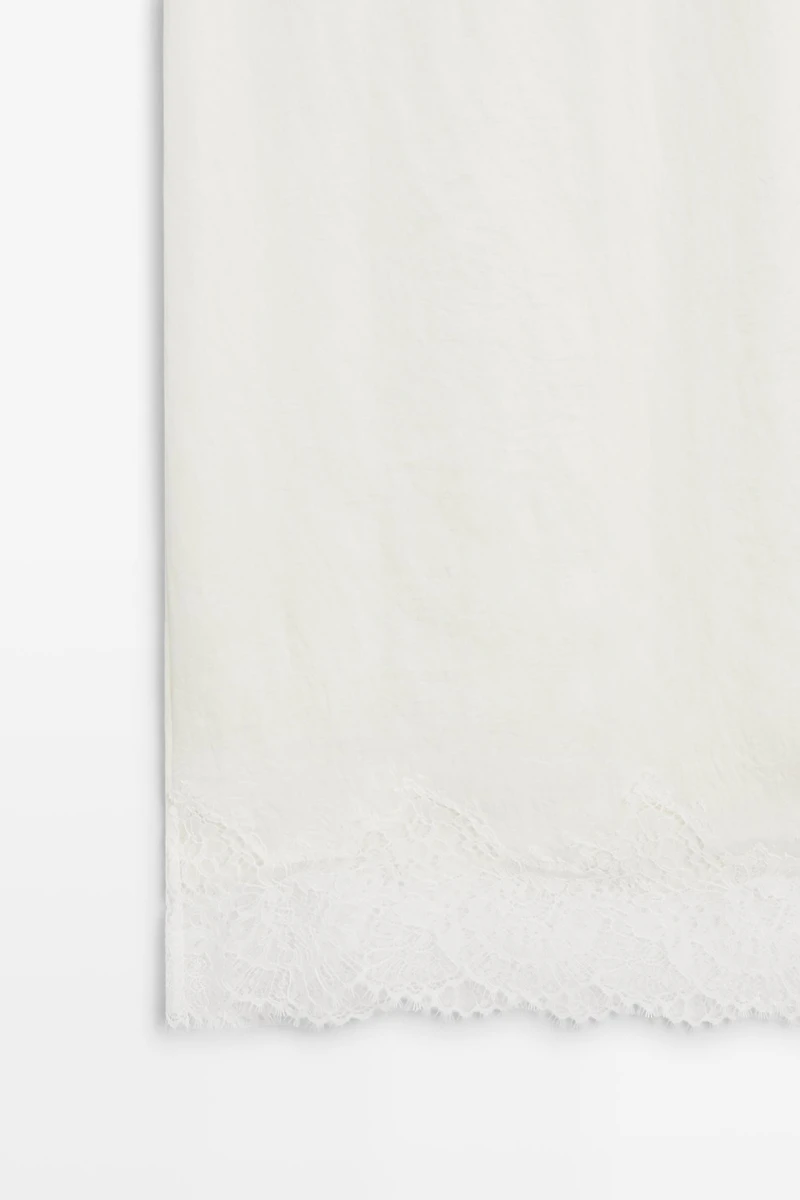 Flowing midi skirt with lace detail