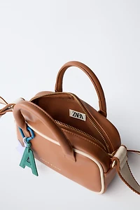 CHARM CROSSBODY BAG