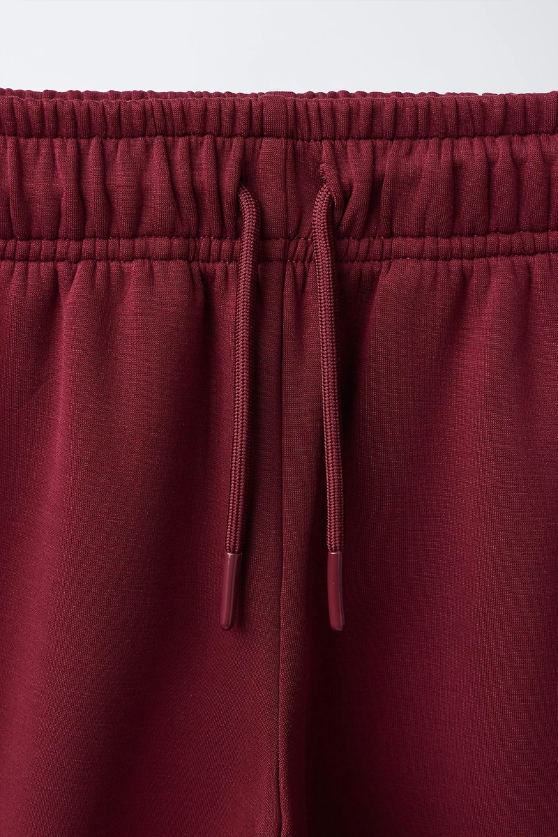 SPORTY CONTRAST PIPING TROUSERS
