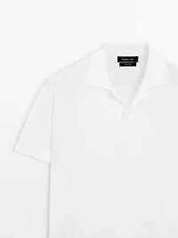 Textured knit short sleeve polo shirt