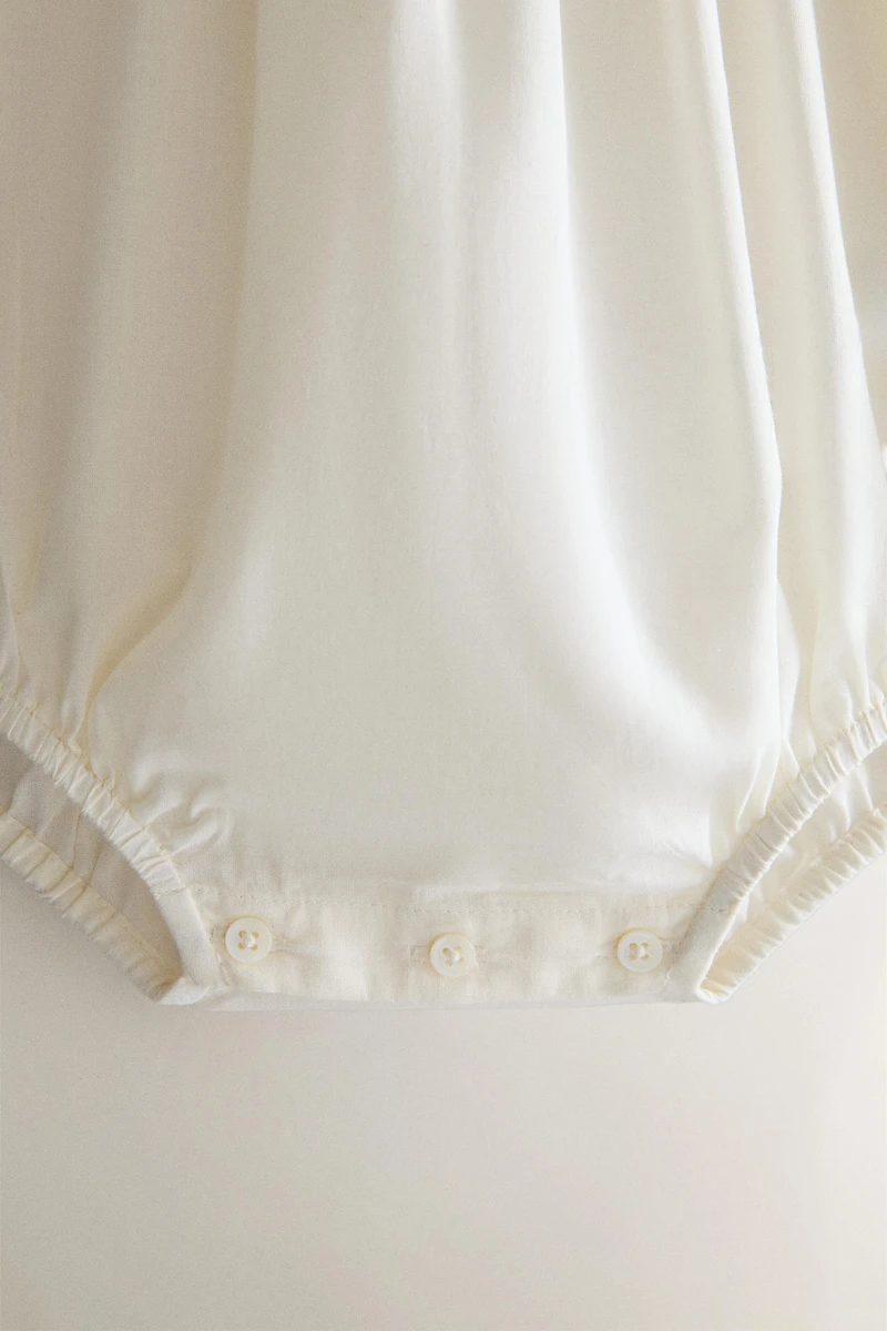 KIDS' SMOCKED BODYSUIT
