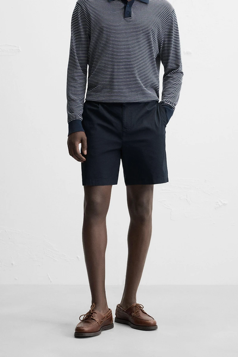 REGULAR FIT PLEATED BERMUDA SHORTS