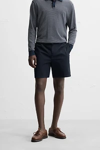 REGULAR FIT PLEATED BERMUDA SHORTS