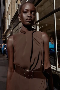 SLEEVELESS BELTED JUMPSUIT