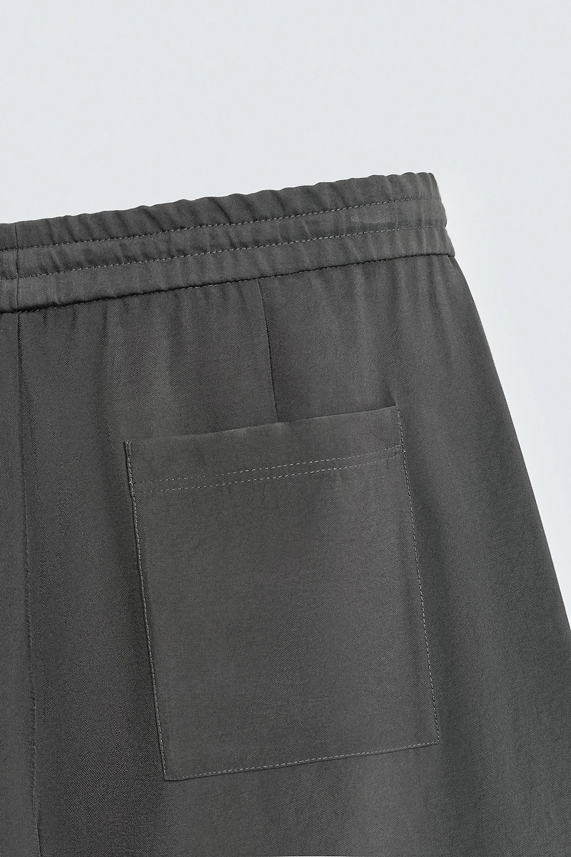FLOWY TOPSTITCHED PANTS