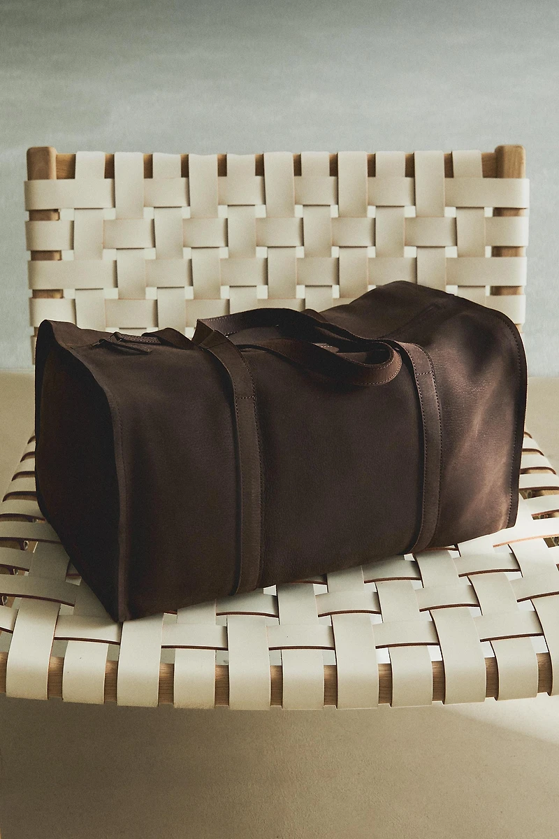 FADED LEATHER TRAVEL BAG