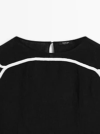 Blouse with contrast embroidery