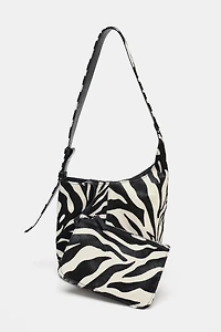 MINI SAC SEAU SOUPLE EN CUIR ASYMÉTRIQUE