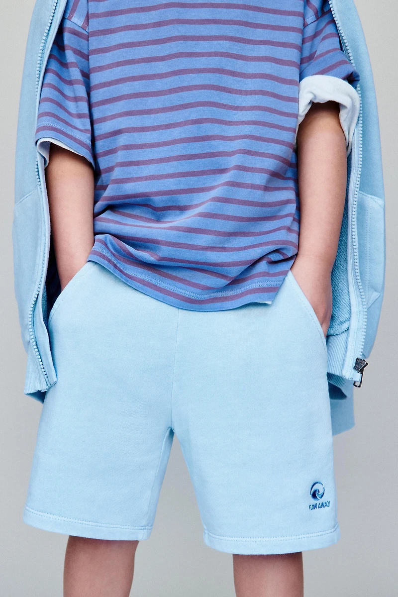 EMBROIDERED GARMENT DYED PLUSH SHORTS