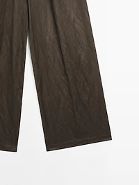 Wide-leg satin trousers with creased effect