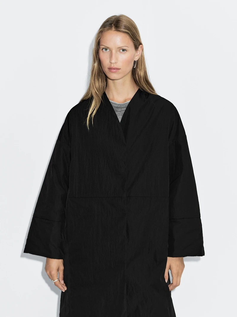 Long padded coat with scarf detail