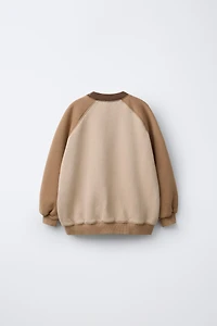 RAGLAN SLEEVE SWEATSHIRT