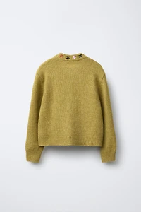 GILET EN MAILLE À FLEURS BRODÉES