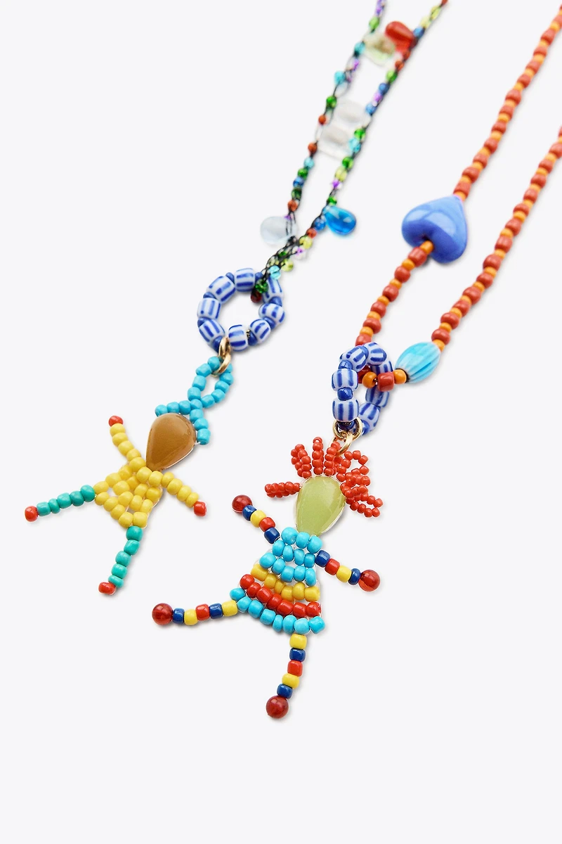 BEADED DOLL NECKLACES