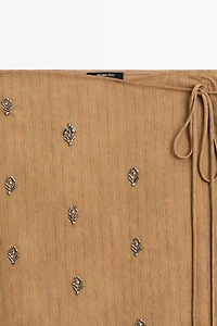 Midi pareo skirt with appliqués