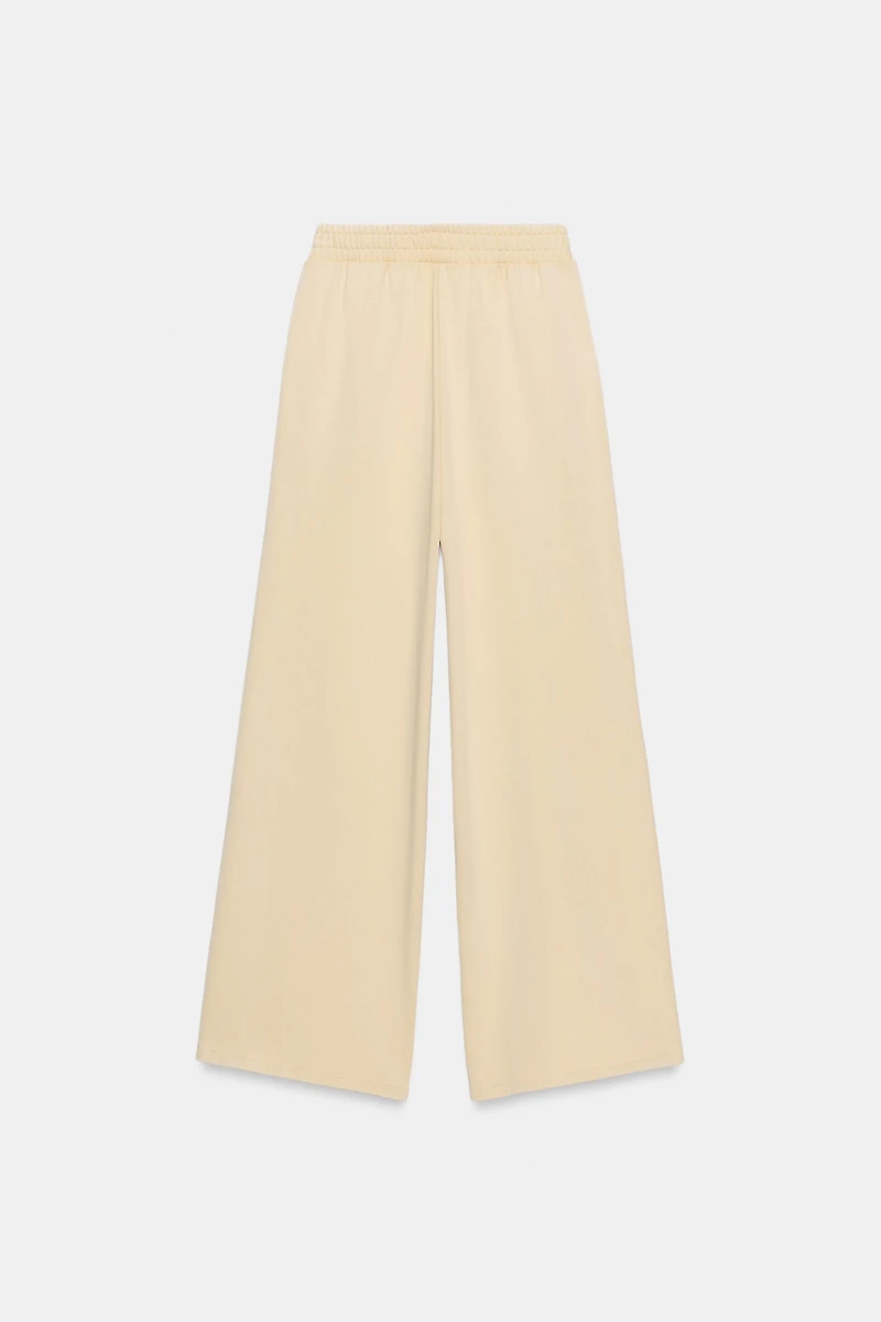 WASHED EFFECT FLEECE PANTS WITH STUDS