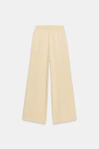 WASHED EFFECT FLEECE PANTS WITH STUDS