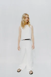 SLEEVELESS ZIP TOP
