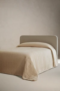 REVERSIBLE FAUX SHEARLING QUILT