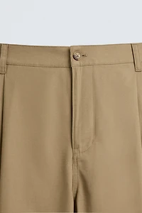 PLEATED WIDE FIT PANTS