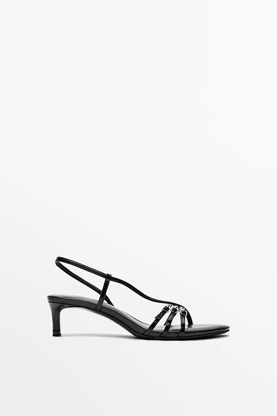 Leather heeled sandals with buckles