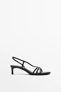 Leather heeled sandals with buckles