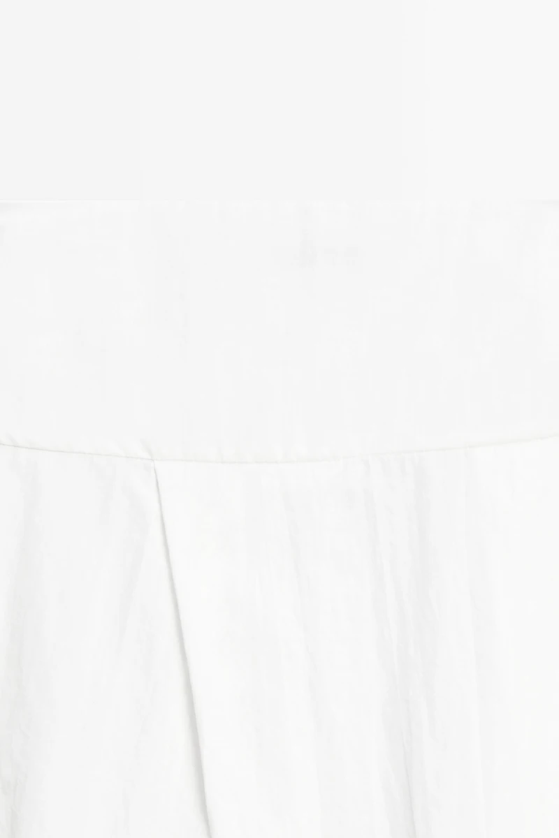 Midi skirt with yoke and pleated detail