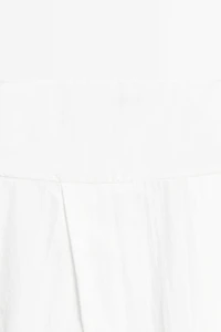 Midi skirt with yoke and pleated detail