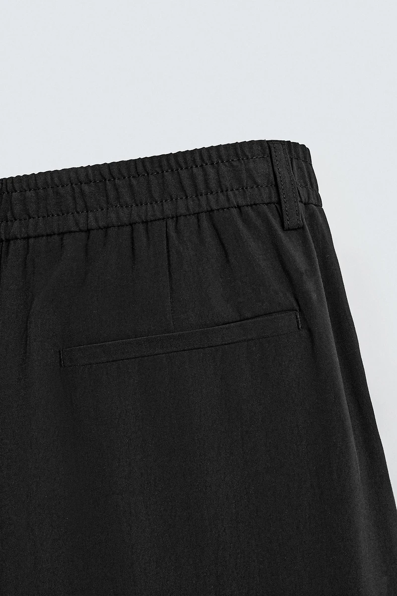 PLEATED FLOWY PANTS
