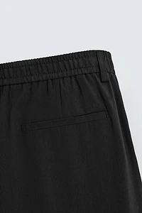 PLEATED FLOWY PANTS