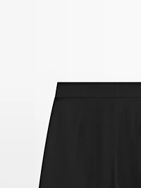 Pantalon satiné à pinces