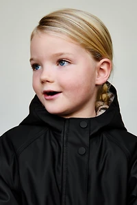 RUBBERIZED WATER REPELLENT FAUX FUR ANIMAL PRINT RAINCOAT