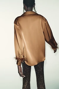 SATIN EFFECT FEATHER BLOUSE
