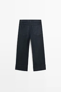 Jean capri à revers