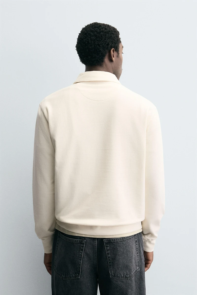 TEXTURED ZIP POLO SHIRT