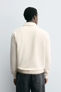 TEXTURED ZIP POLO SHIRT